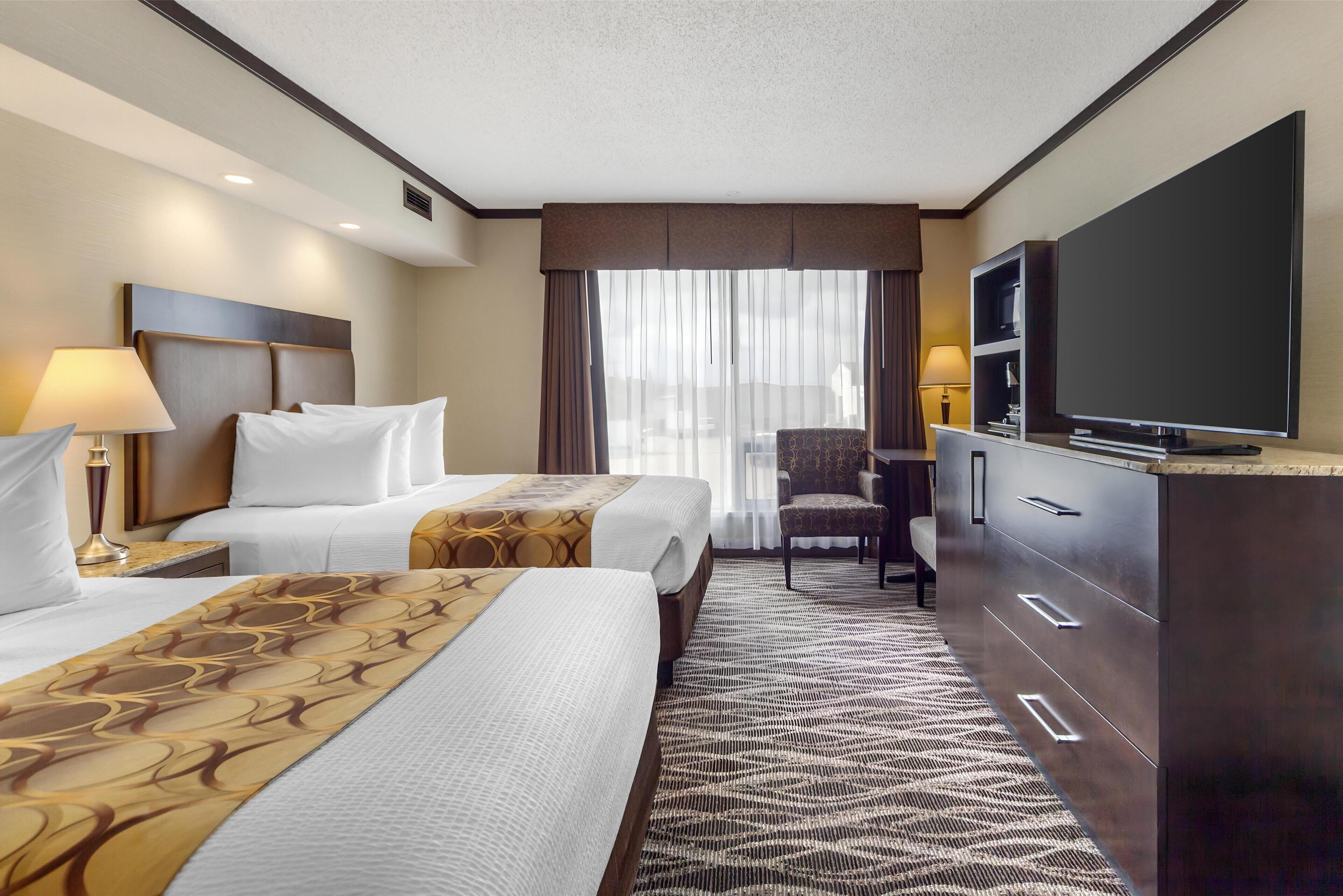 standard room, 2 double beds, non smoking, refrigerator & microwave | minibar, in-room safe, iron/ironing board, free rollaway beds