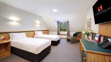 Kahden hengen huone (kaksi sänkyä) | Silitysrauta/-lauta, ilmainen Wi-Fi, vuodevaatteet