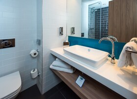 Shower, eco-friendly toiletries, hair dryer, towels
