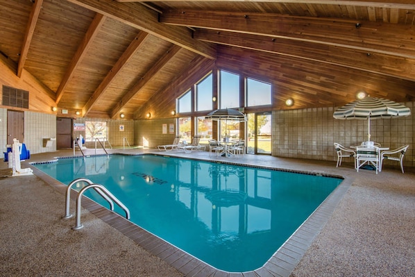 Indoor pool, open 7:00 AM to 11:00 PM, pool loungers