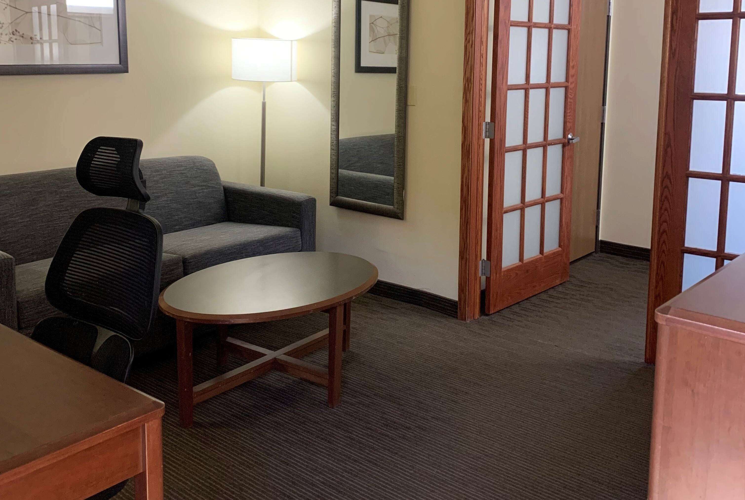 deluxe studio suite, 1 king bed, non smoking | desk, iron/ironing board, free cots/infant beds, rollaway beds