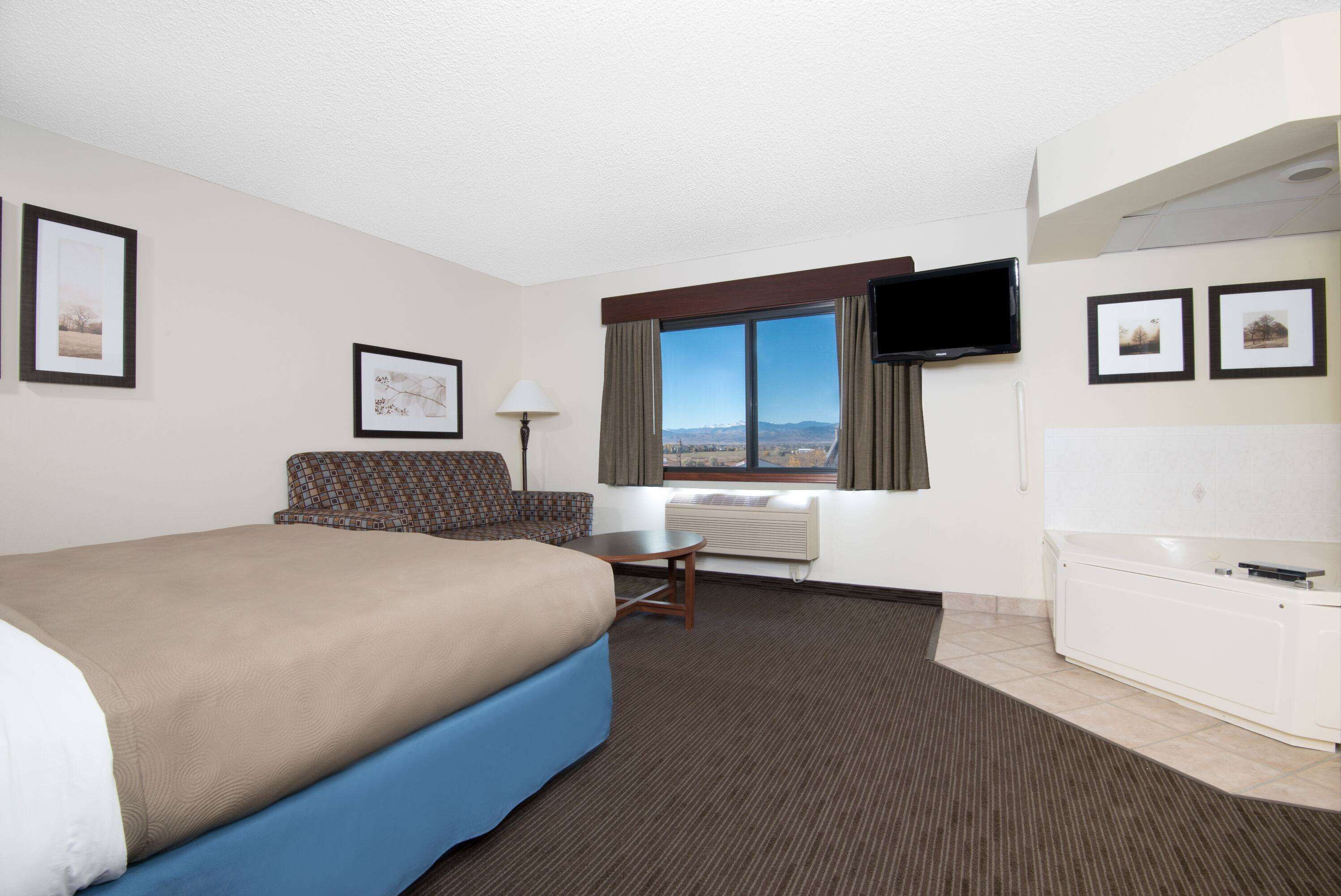 studio suite, 1 king bed, non smoking | desk, iron/ironing board, free cots/infant beds, rollaway beds