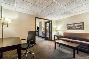 Suite, 1 King Bed, Non Smoking (One-Bedroom) | Pillowtop beds, desk, laptop workspace, iron/ironing board