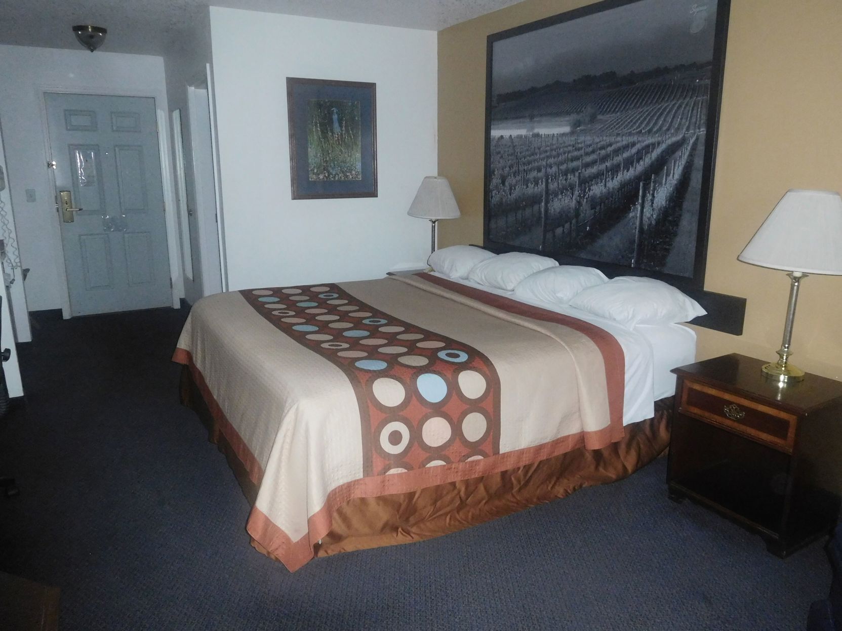Desk, laptop workspace, blackout curtains, iron/ironing board