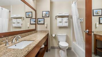 Suite, 1 King Bed, Non Smoking, Jetted Tub | Bathroom | Combined shower/bathtub, free toiletries, hair dryer, towels