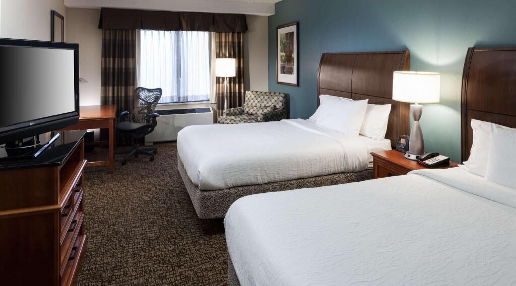 Premium bedding, blackout drapes, iron/ironing board