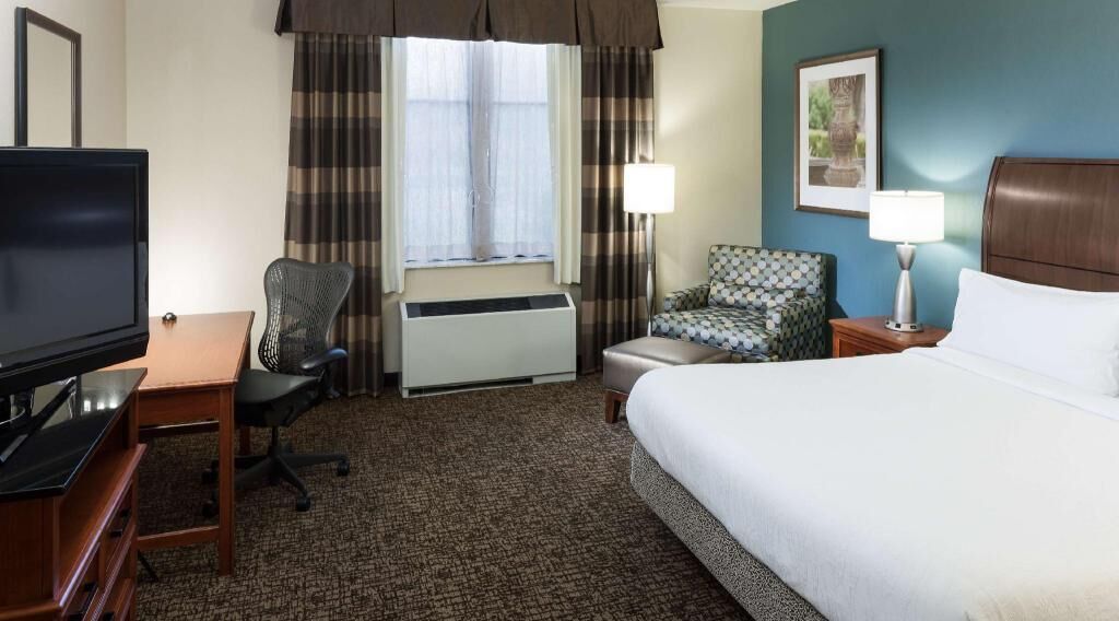 Premium bedding, blackout drapes, iron/ironing board