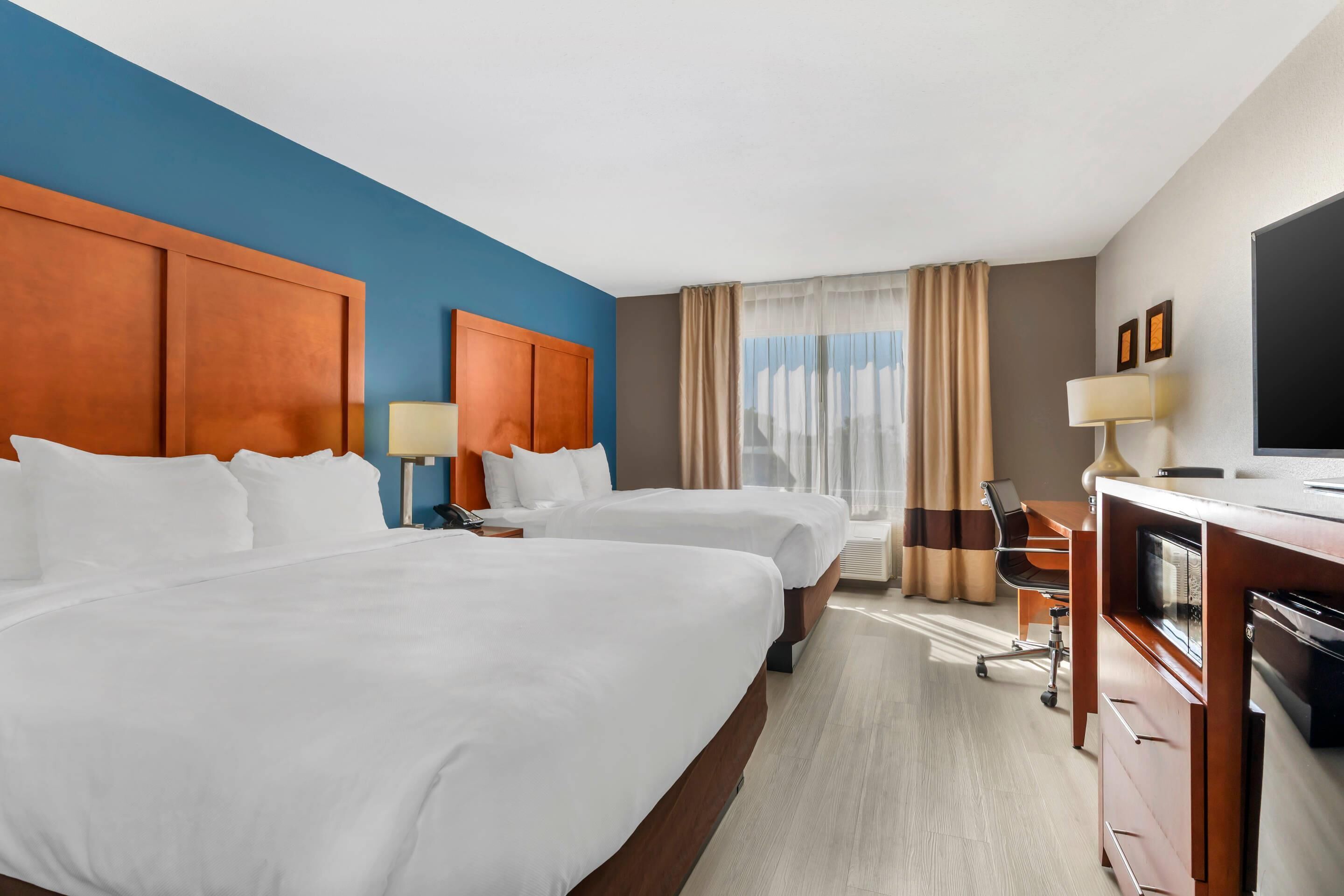 Standard Room, 2 Queen Beds | In-room safe, iron/ironing board, free WiFi, bed sheets