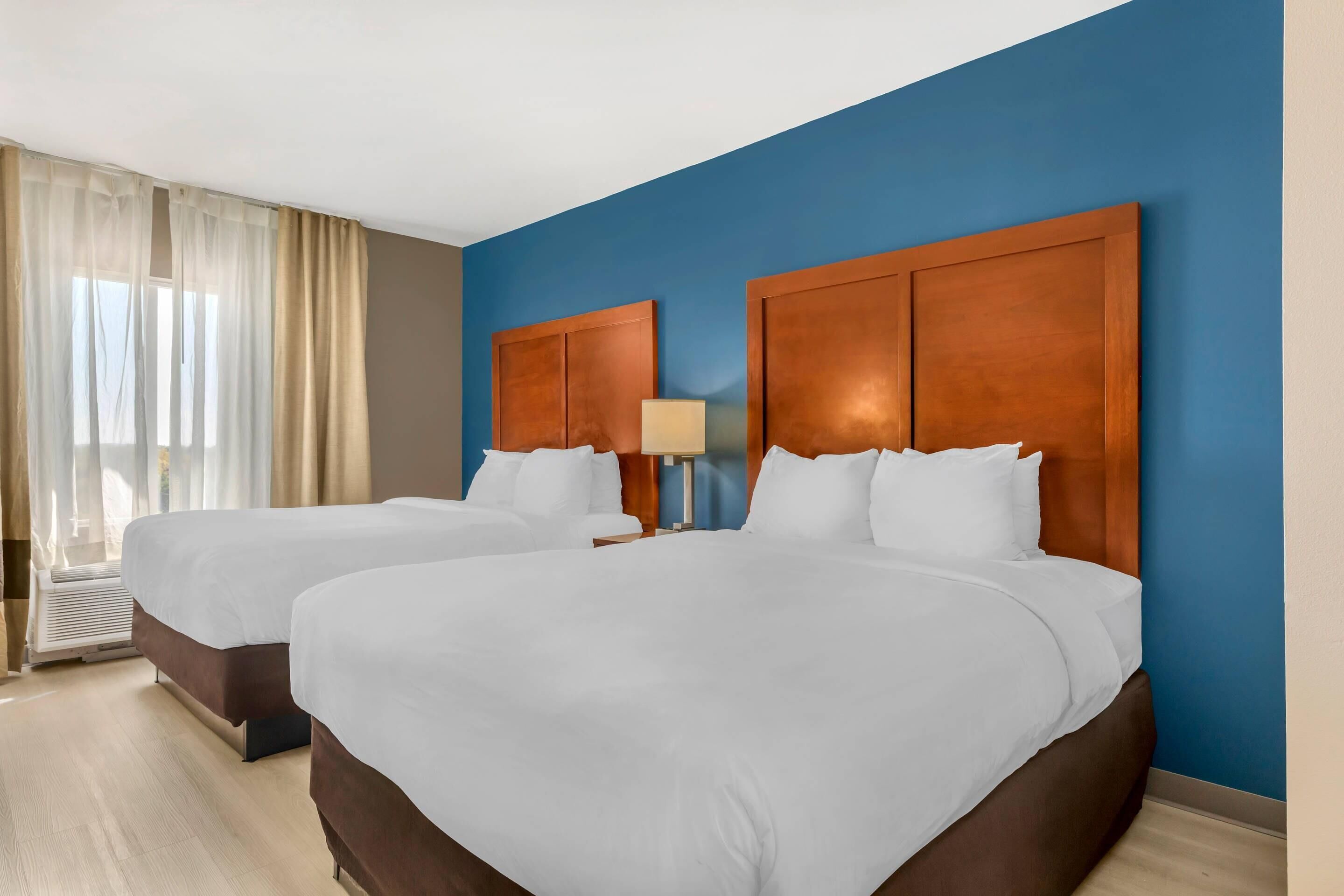 Suite, 1 Queen Bed | In-room safe, iron/ironing board, free WiFi, bed sheets
