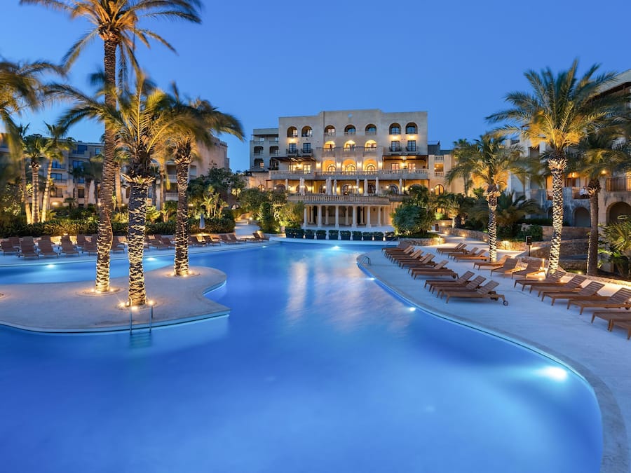 2 indoor pools, 3 outdoor pools, open 7:00 AM to 9:00 PM, pool umbrellas