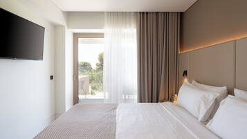 Single Room | เครื่องนอนระดับพรีเมียม, ผ้านวมขนเป็ด, มินิบาร์, ตู้นิรภัยในห้องพัก