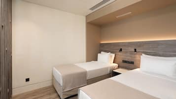 Roba de llit d'alta qualitat, cobrellits i minibar