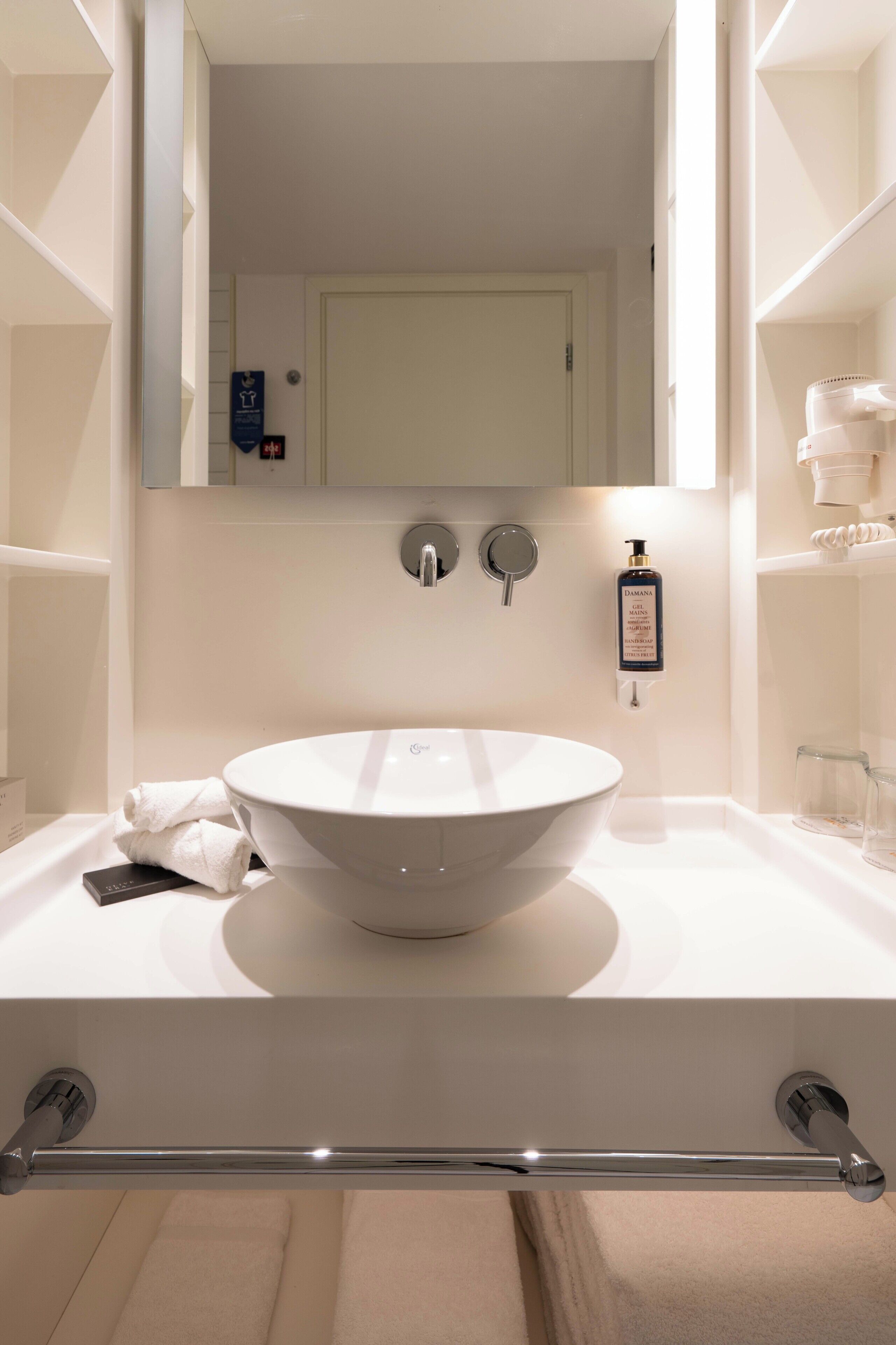 Shower, hair dryer, slippers, towels