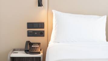 Premium bedding, down duvets, minibar, in-room safe