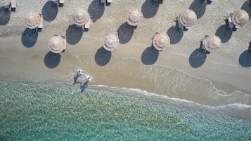 Praia particular, barracas de praia (sobretaxa), espreguiçadeiras