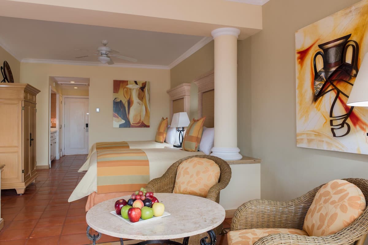 Premium bedding, down comforters, pillowtop beds, minibar