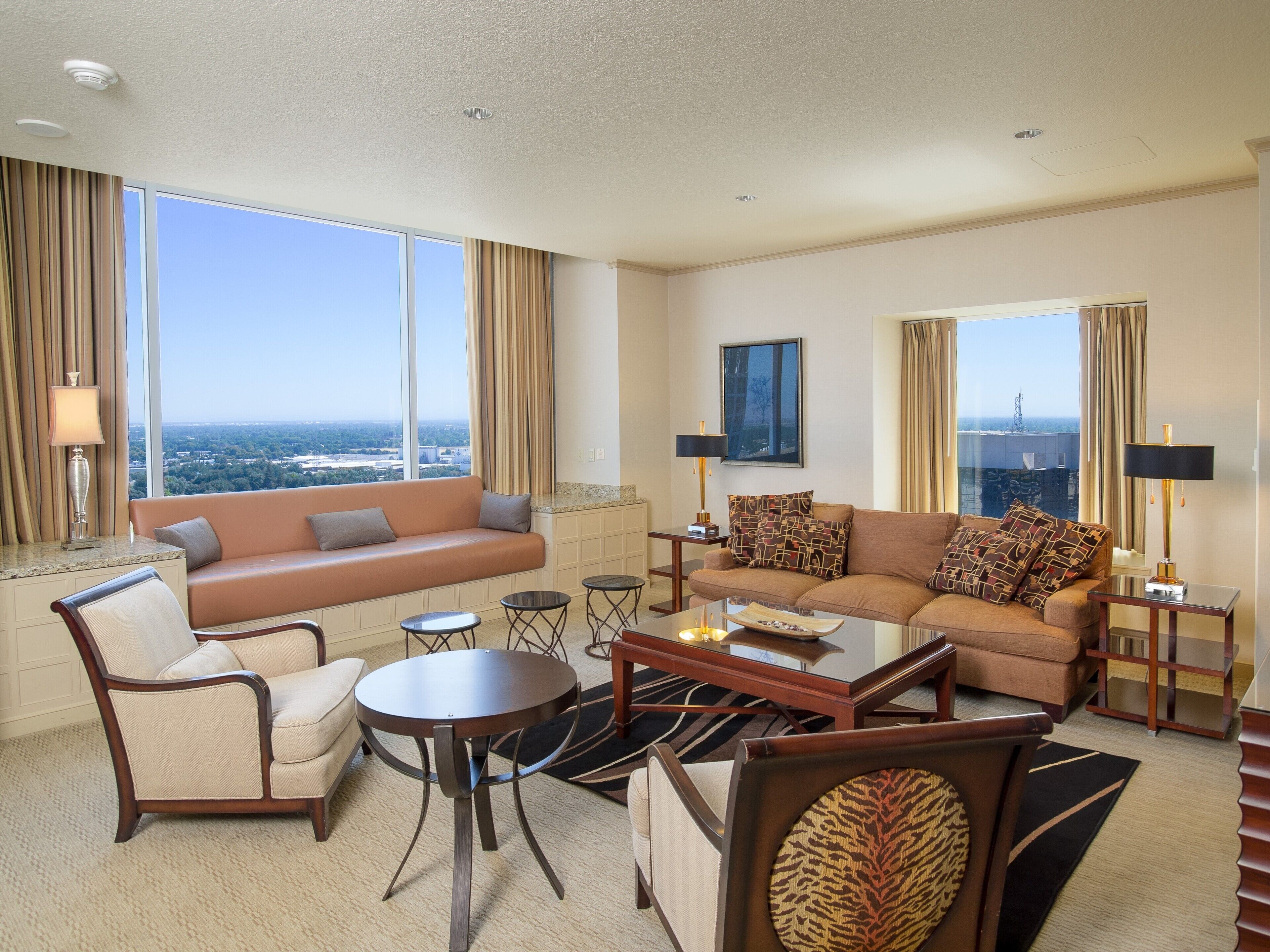 Grand Suite, 1 King Bed | Living area | Flat-screen TV, iPod dock