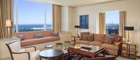 Grand Suite, 1 King Bed | Living area | Flat-screen TV, iPod dock