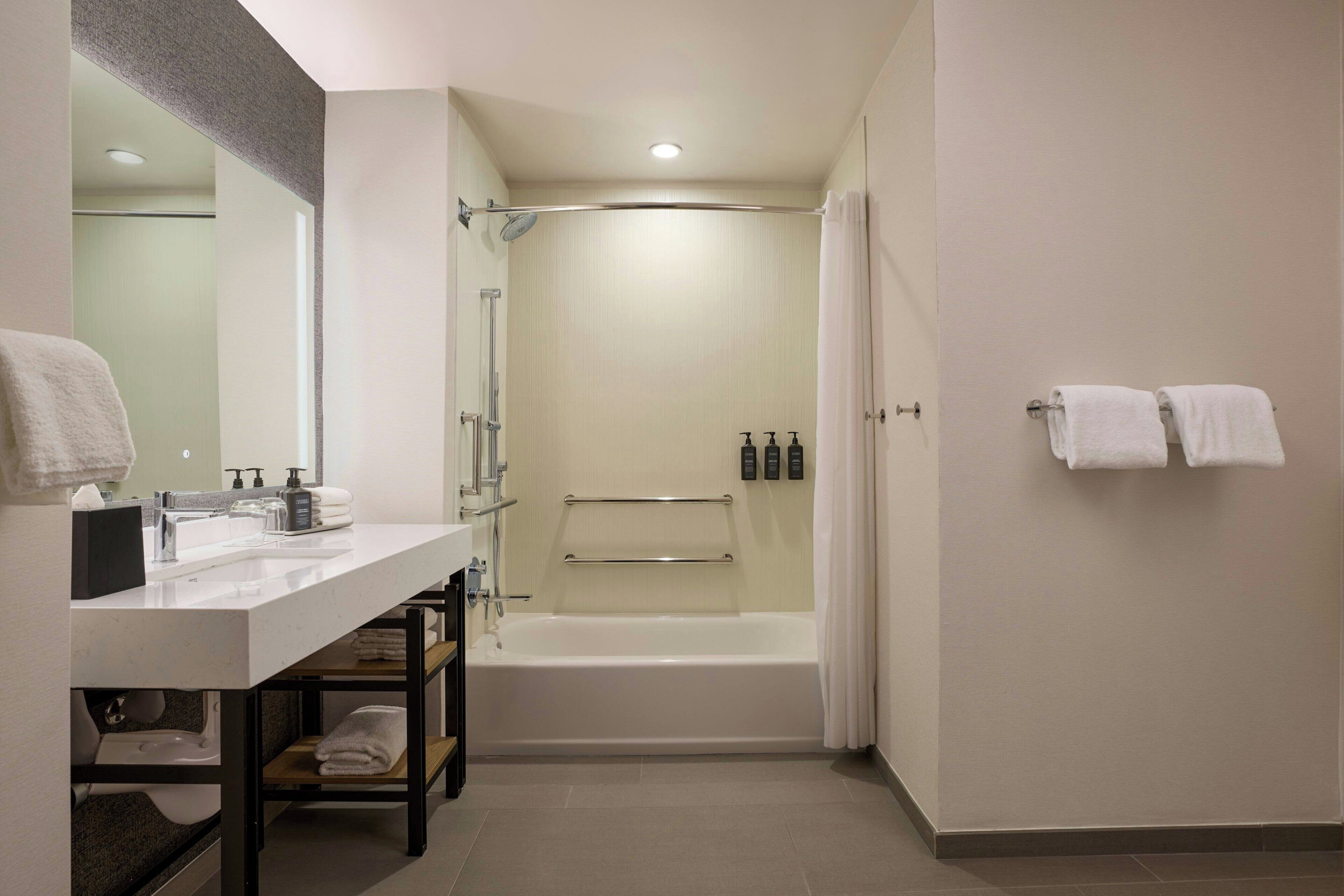 combined shower/bathtub, free toiletries, hair dryer, towels