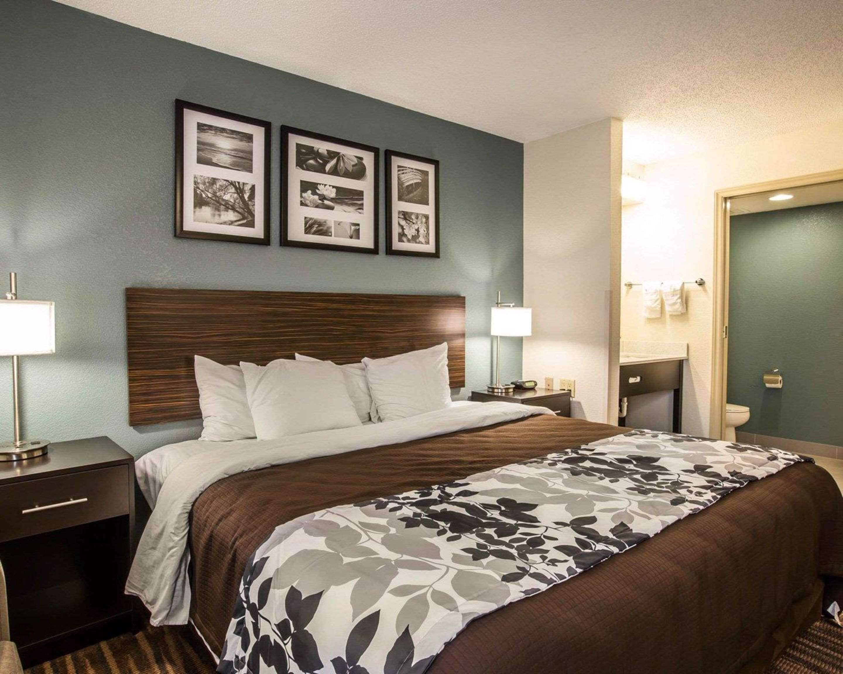 desk, laptop workspace, iron/ironing board, rollaway beds