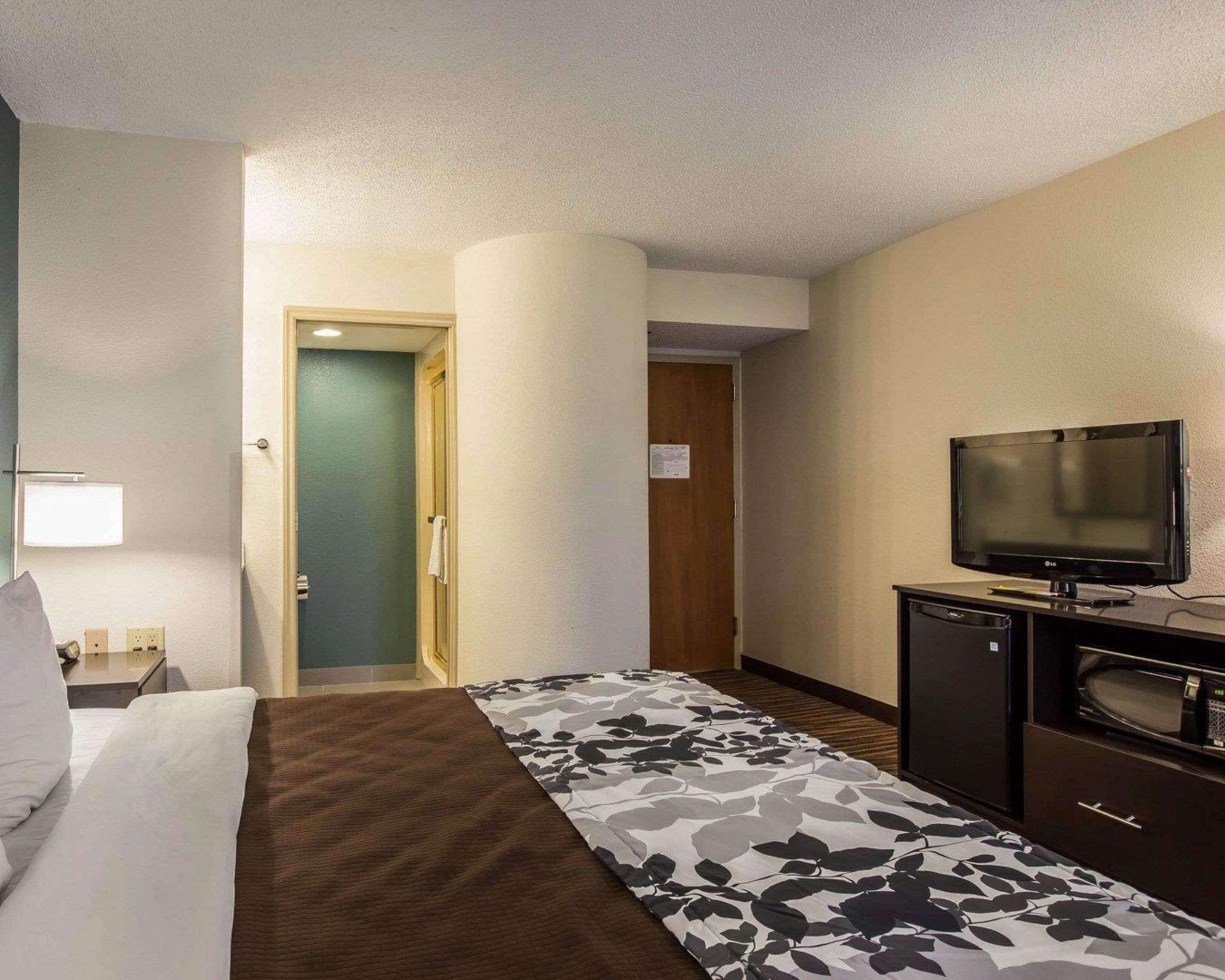 desk, laptop workspace, iron/ironing board, rollaway beds