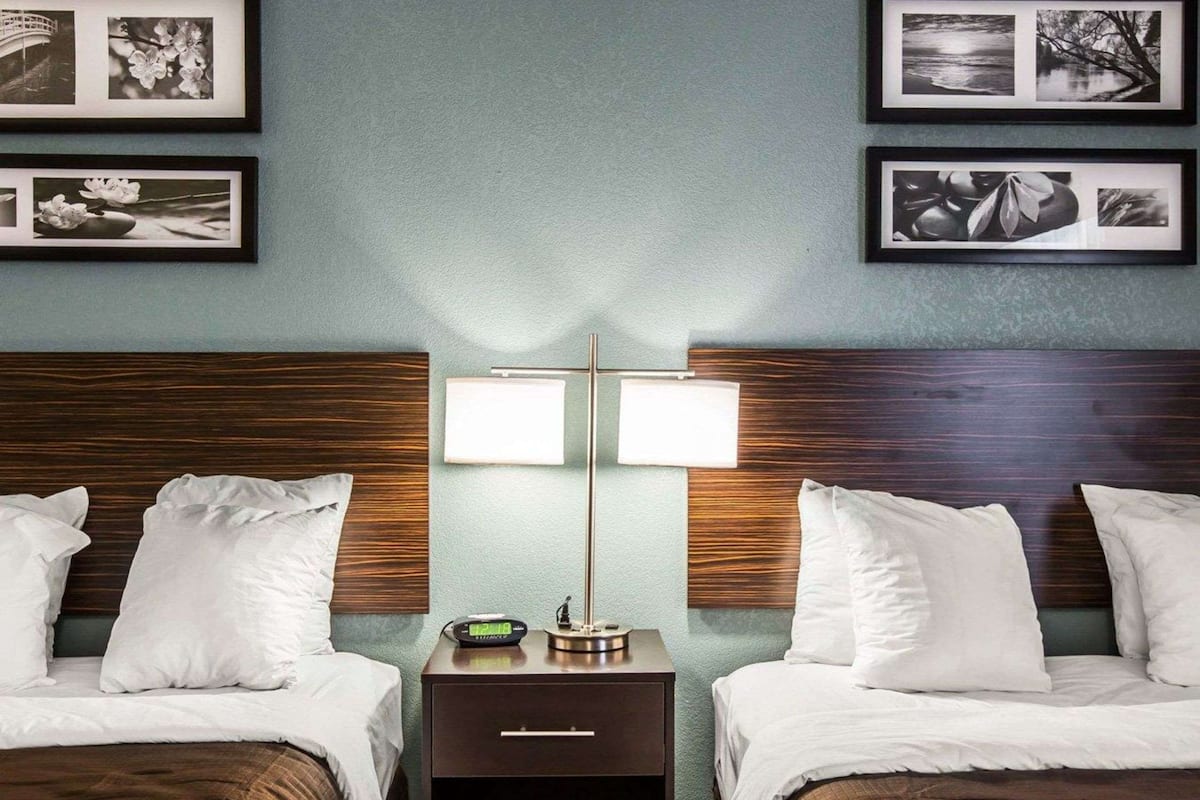 standard room, 2 queen beds, non smoking | desk, laptop workspace, iron/ironing board, rollaway beds