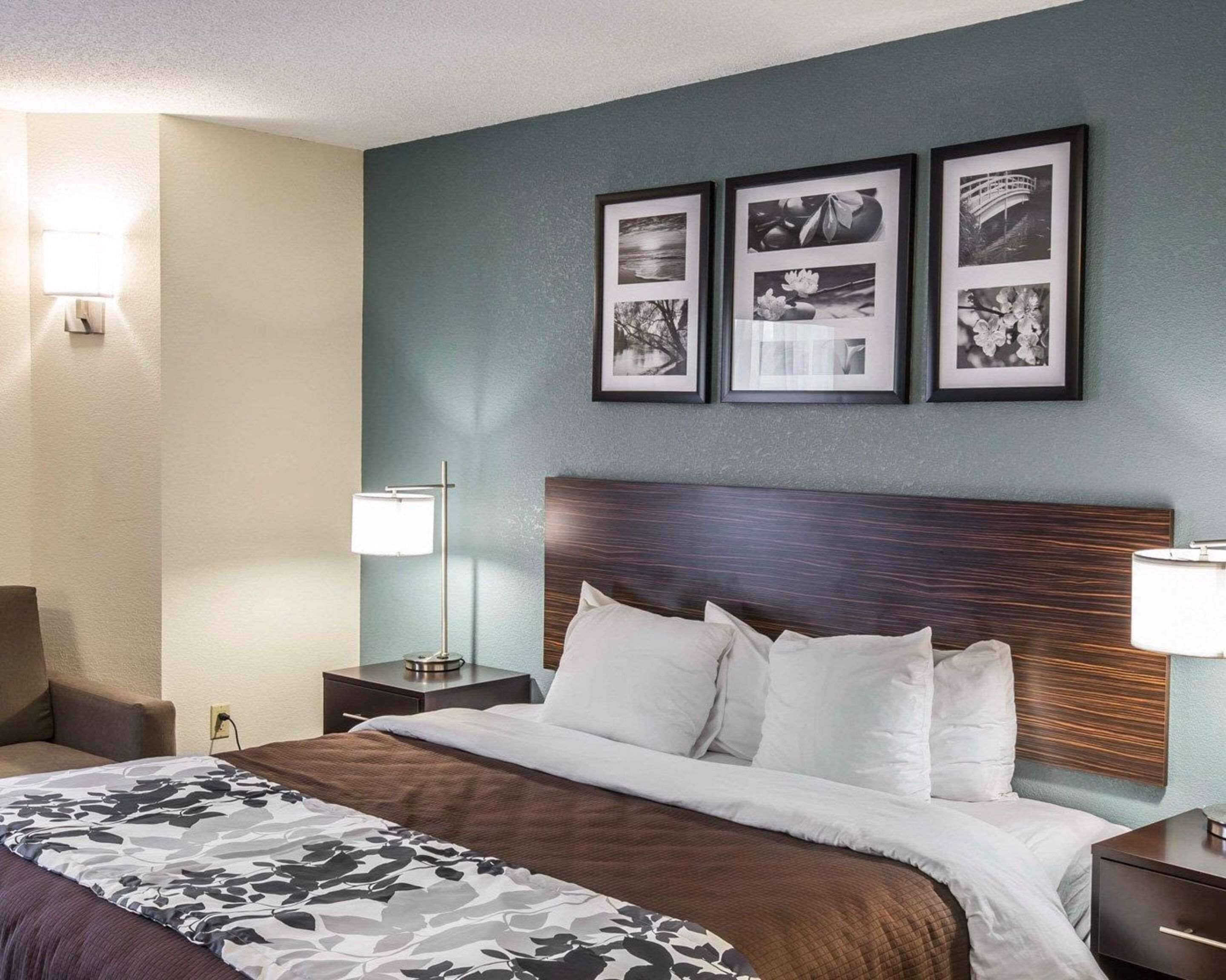 desk, laptop workspace, iron/ironing board, rollaway beds