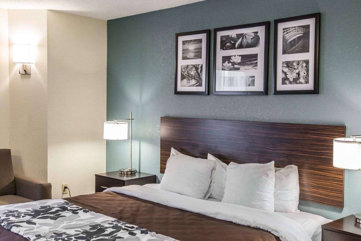 desk, laptop workspace, iron/ironing board, rollaway beds