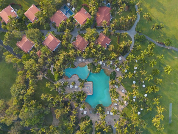 Outdoor pool, pool umbrellas, sun loungers