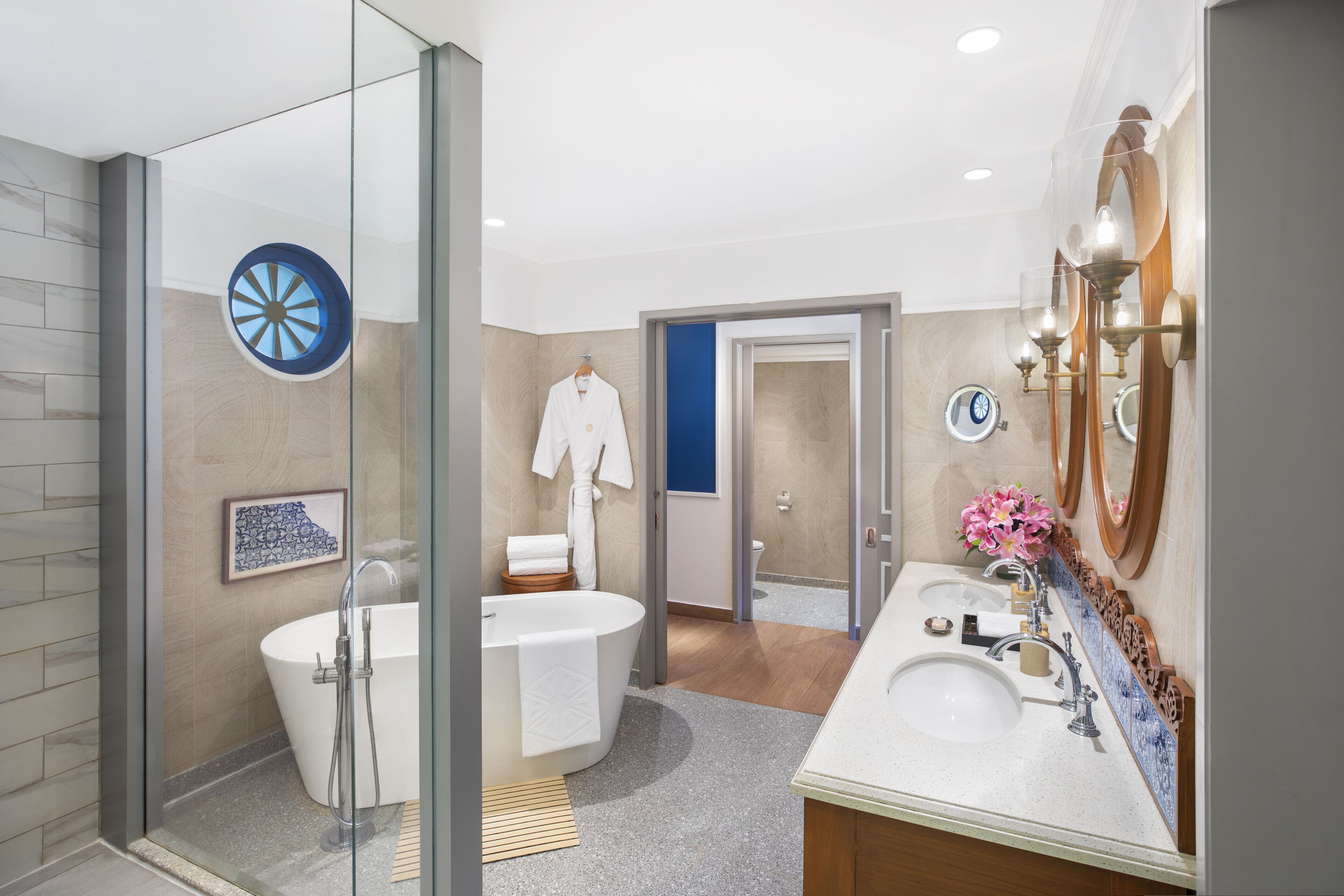 separate bathtub and shower, deep-soaking bathtub, designer toiletries