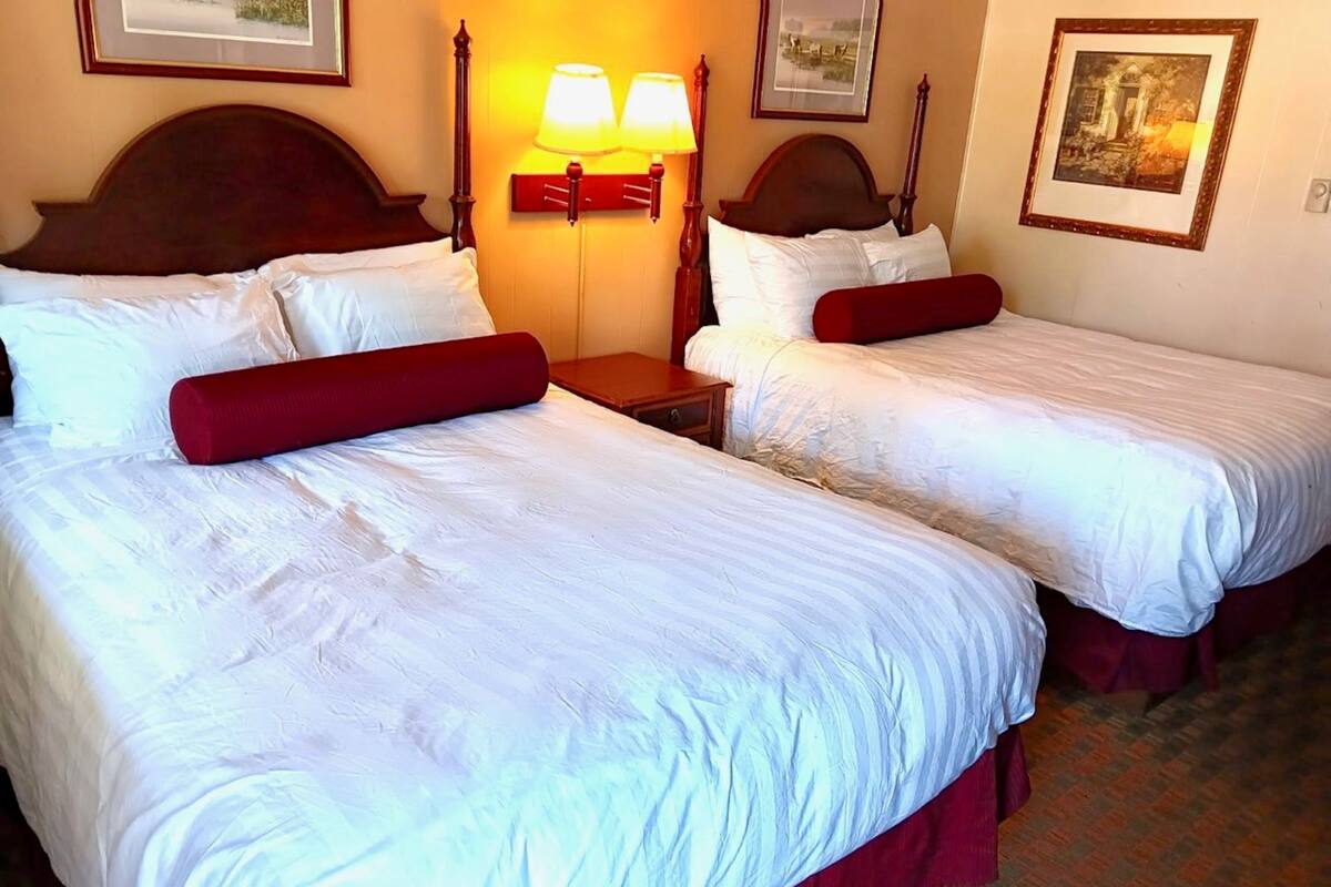 Pillow-top beds, desk, blackout curtains, iron/ironing board