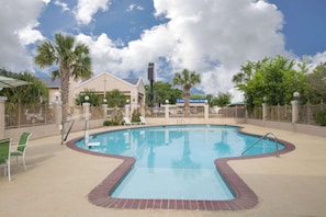 Seasonal outdoor pool, open 9 AM to 10 PM, pool loungers