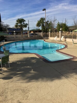 Seasonal outdoor pool, pool loungers