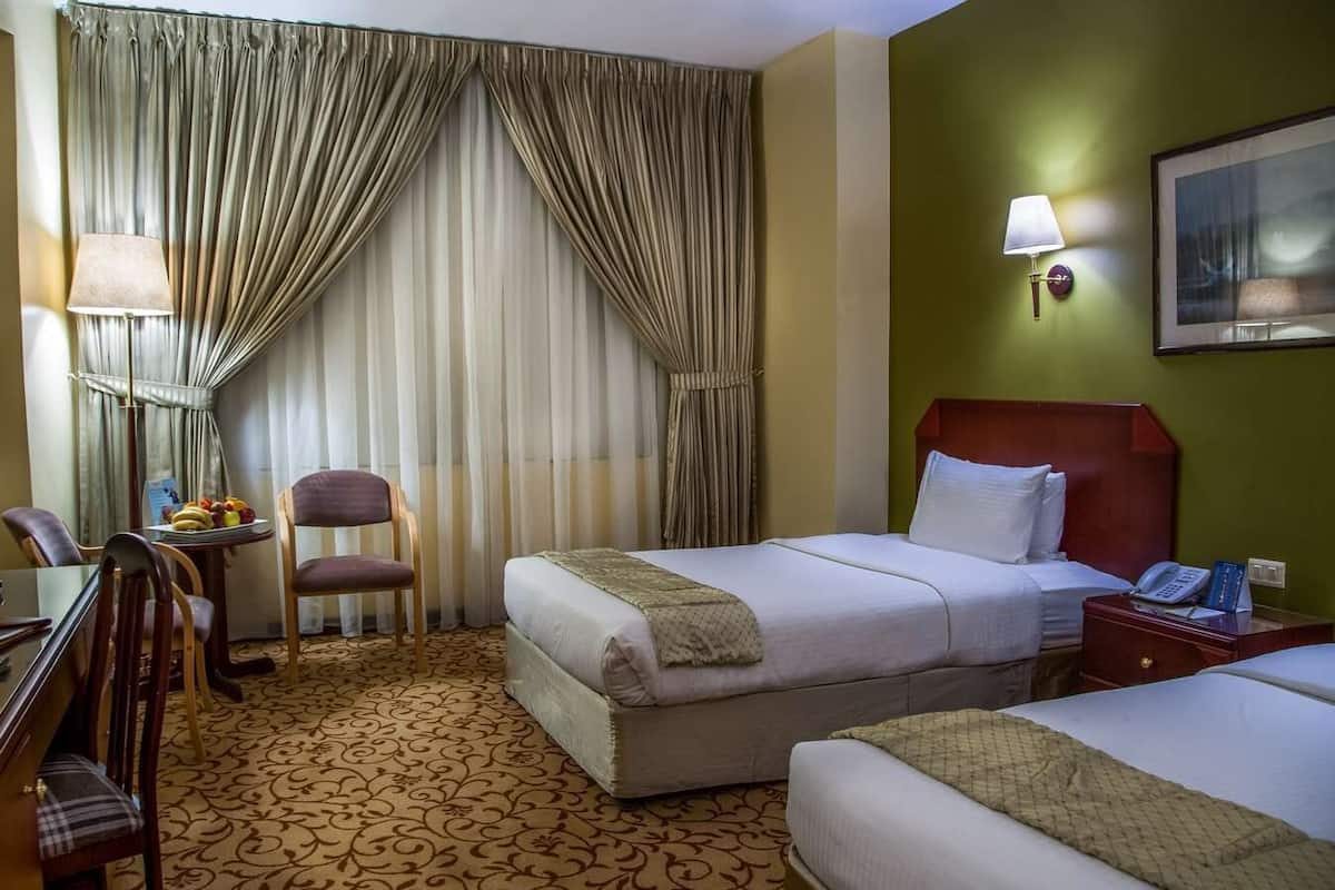 Egyptian cotton sheets, premium bedding, minibar, in-room safe