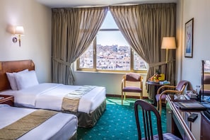Egyptian cotton sheets, premium bedding, minibar, in-room safe