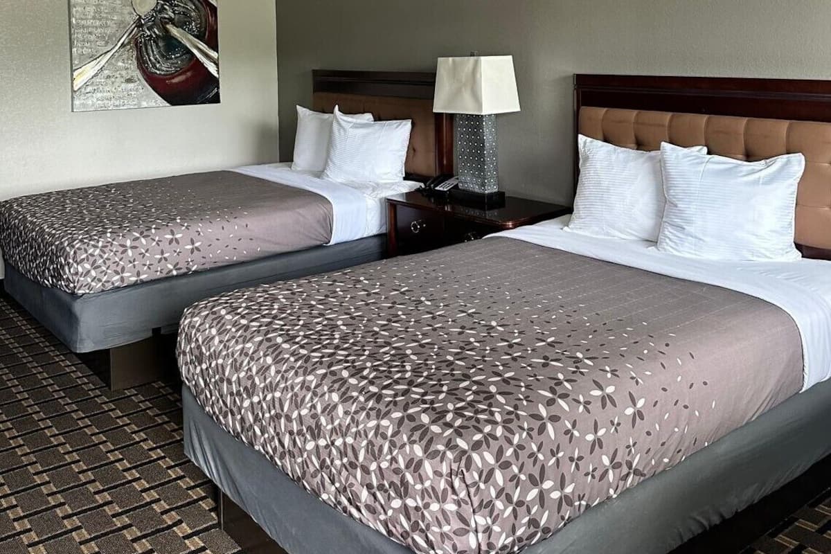 Minibar, desk, blackout curtains, iron/ironing board