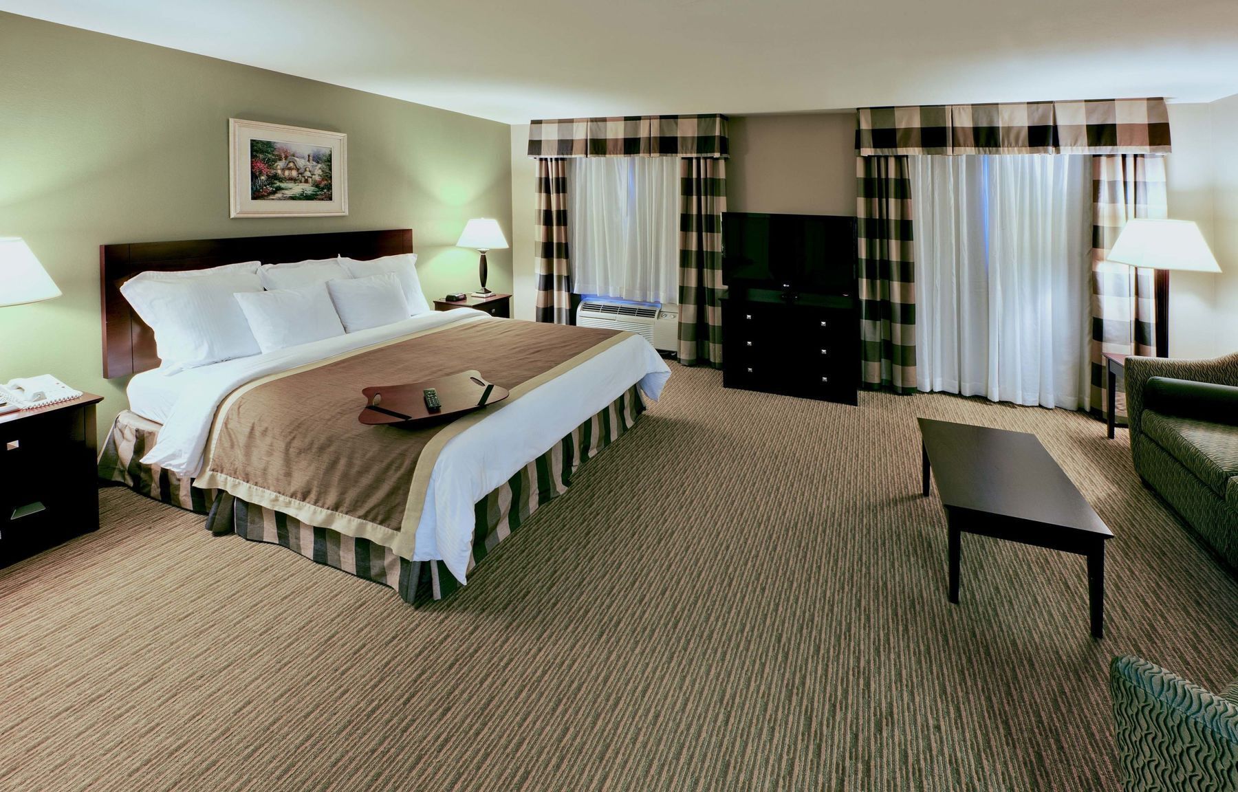 Premium bedding, desk, laptop workspace, iron/ironing board