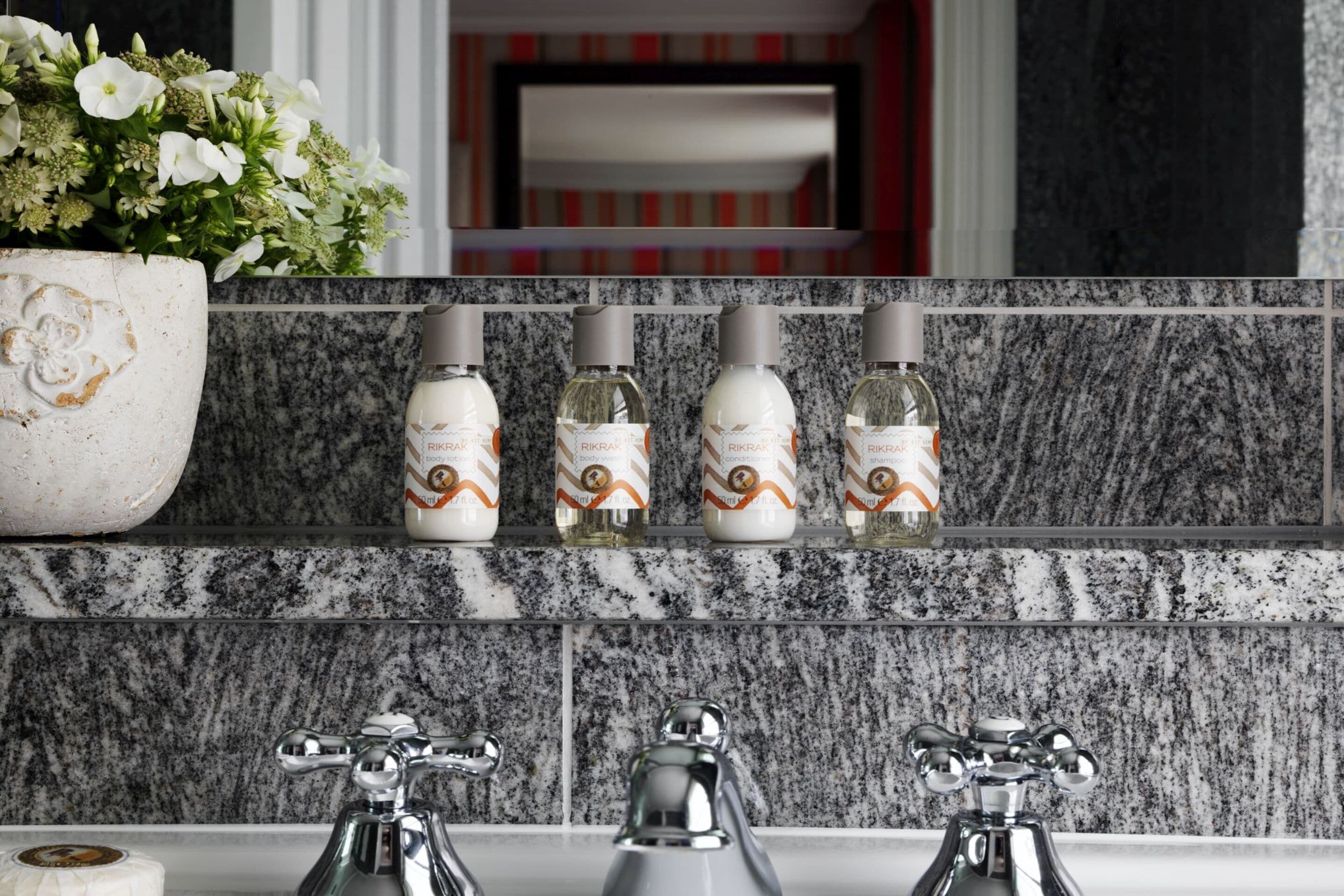 rainfall showerhead, designer toiletries, hair dryer, bathrobes