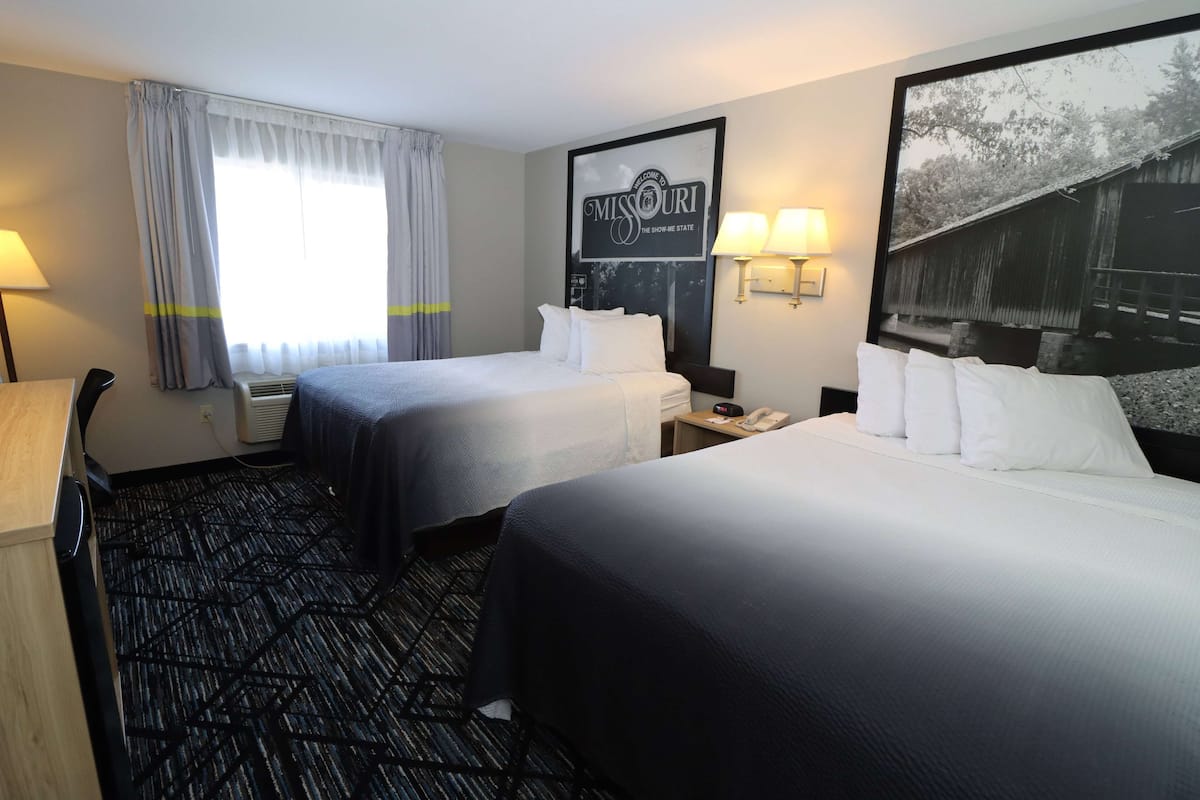 Standard Room, 2 Queen Beds, Refrigerator & Microwave | In-room safe, desk, laptop workspace, blackout drapes