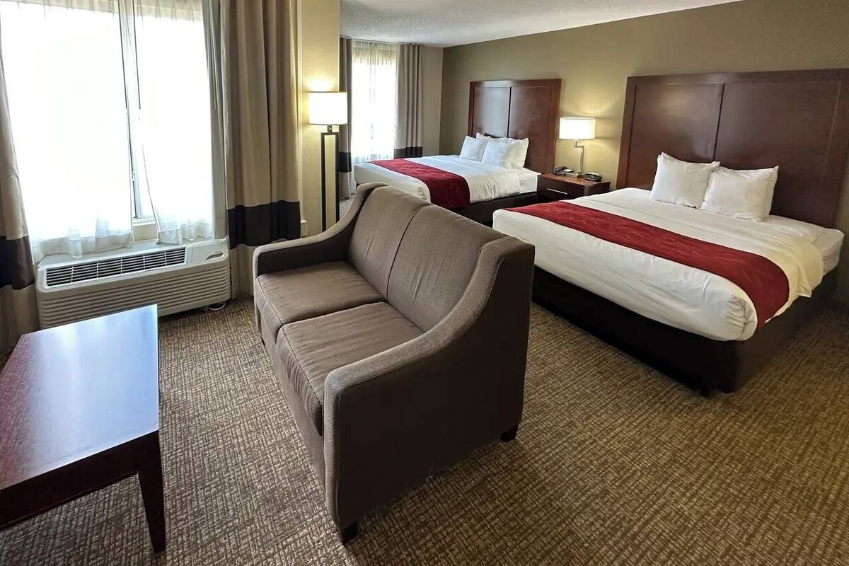 Down comforters, desk, blackout drapes, iron/ironing board