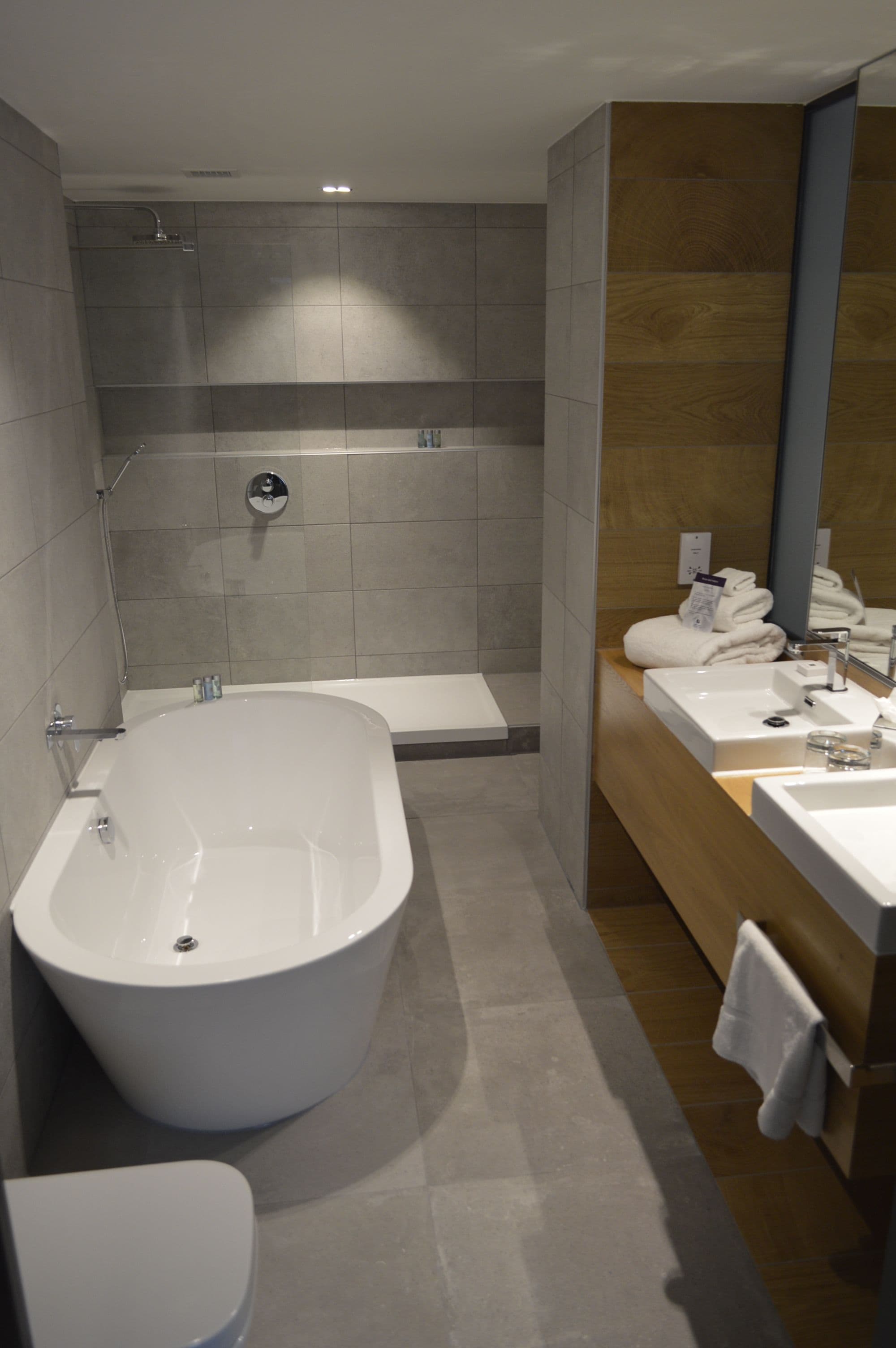 suite, 1 king bed | bathroom | free toiletries, hair dryer, towels