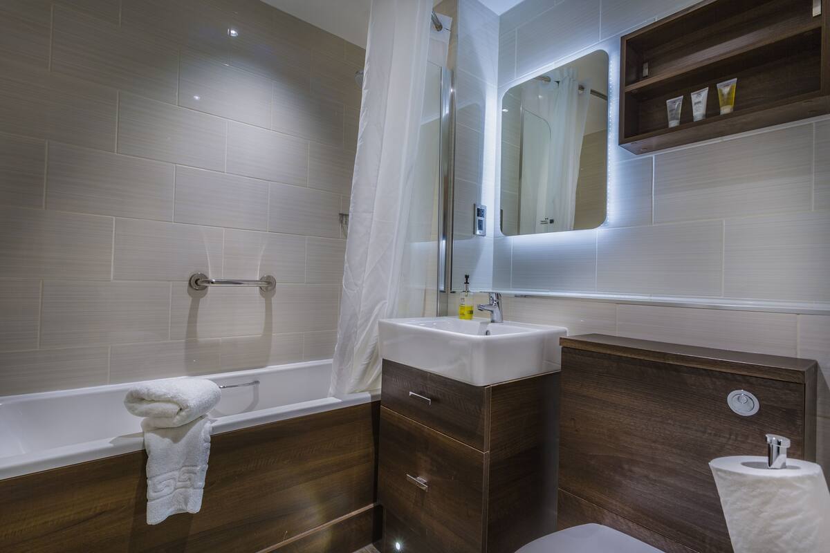 superior family room | bathroom | free toiletries, hair dryer, towels, soap