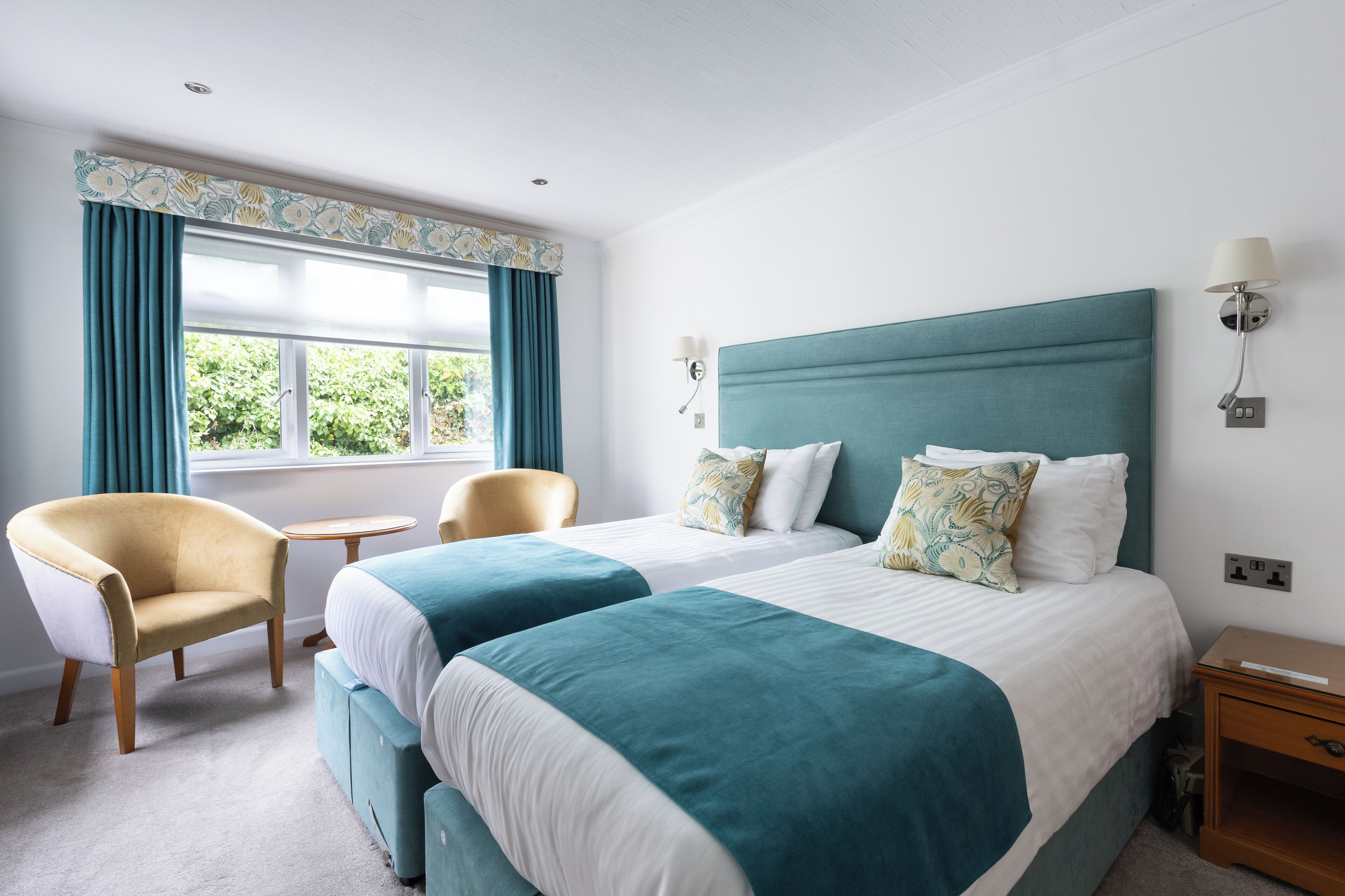 comfort room, 2 single beds, non smoking | in-room safe, desk, blackout curtains, iron/ironing board