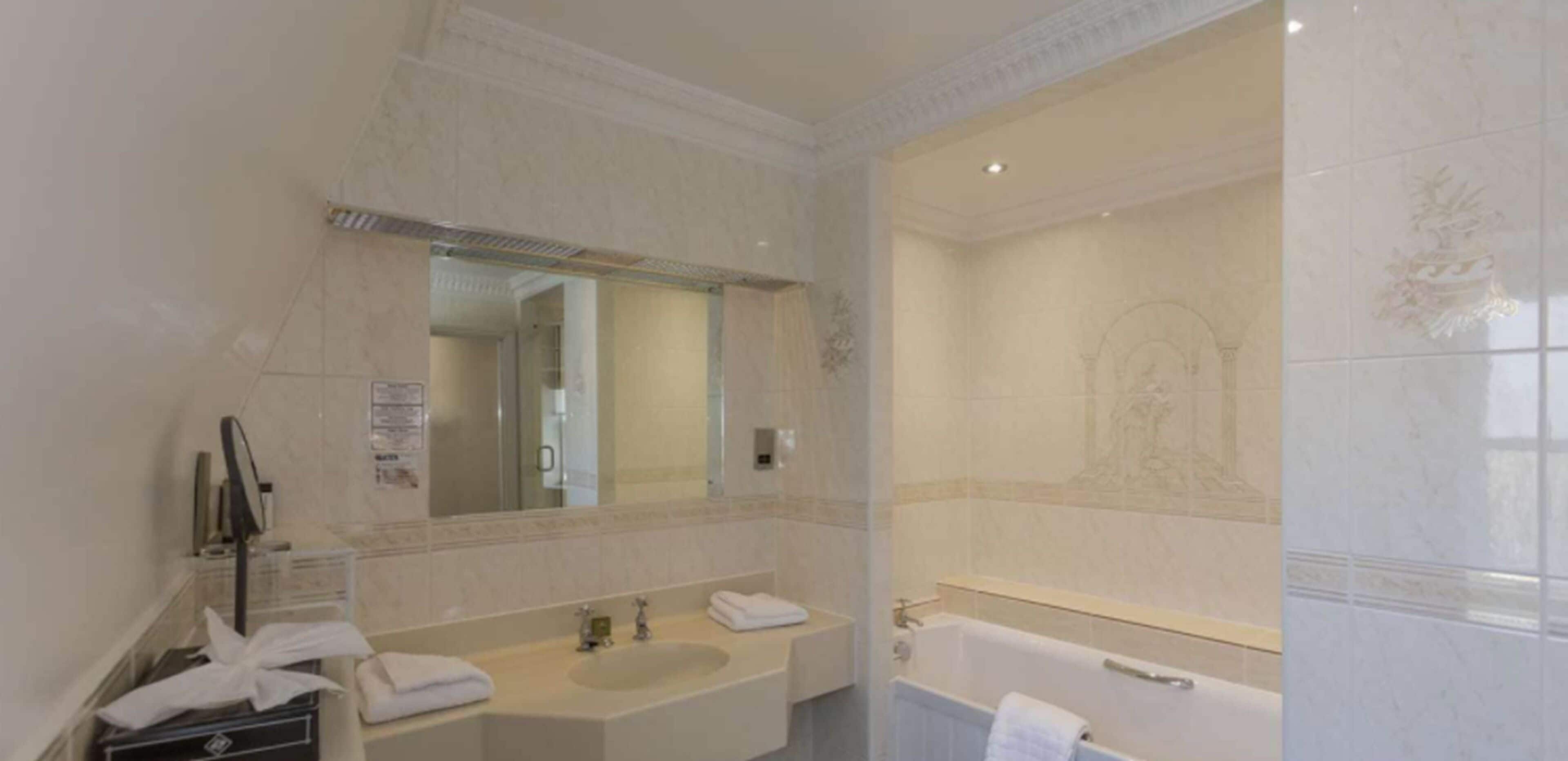 deep-soaking bathtub, free toiletries, hair dryer, towels