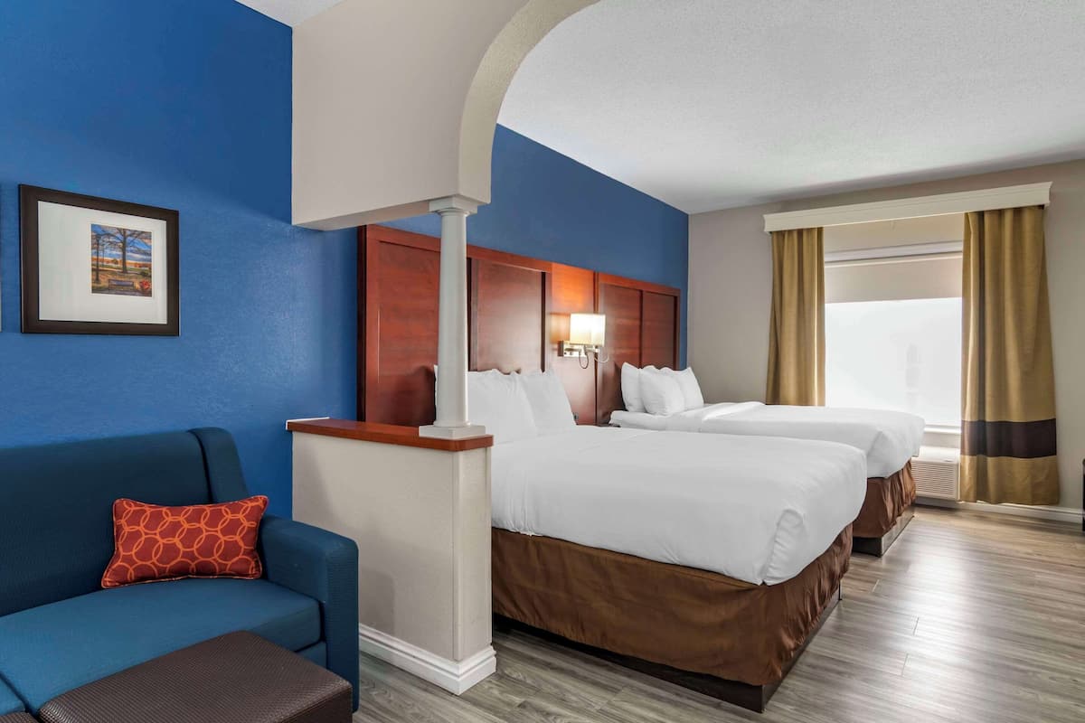 Suite, Multiple Beds, Non Smoking (2 Queen, 2 Person Sofa Bed) | In-room safe, desk, laptop workspace, blackout curtains