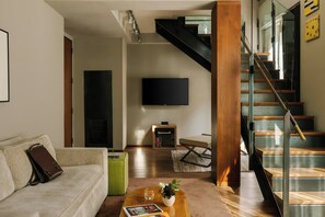 32-inch flat-screen TV with cable channels, TV, streaming services