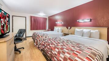Deluxe Room, 2 Queen Beds, Non Smoking | Desk, laptop workspace, blackout drapes, free cribs/infant beds