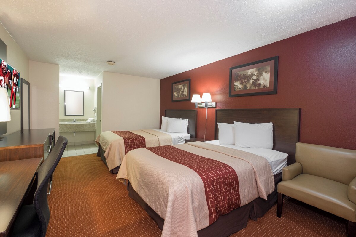 Deluxe Room, 2 Queen Beds, Non Smoking | Desk, laptop workspace, blackout curtains, iron/ironing board