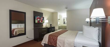 Desk, laptop workspace, blackout curtains, iron/ironing board