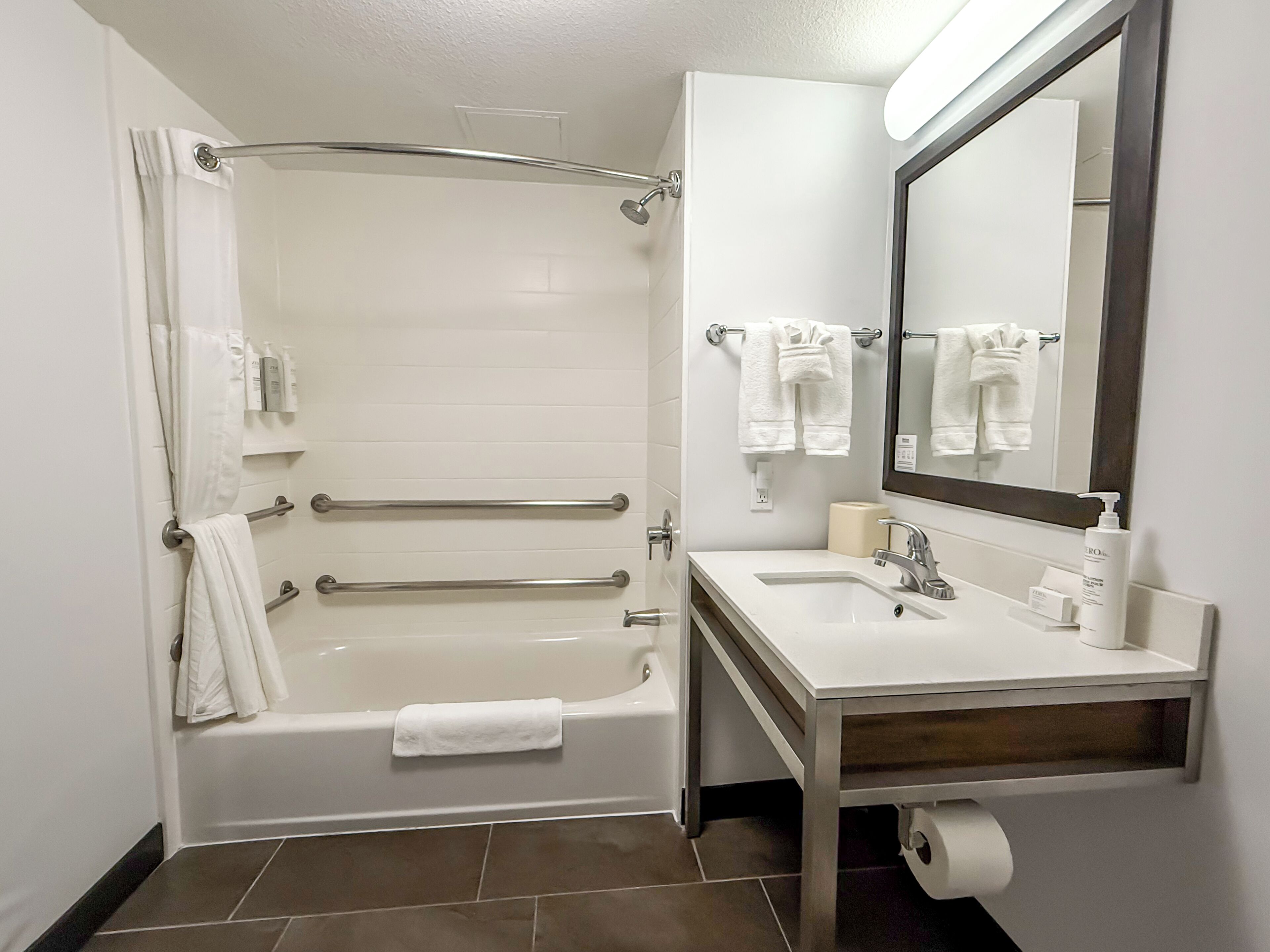 combined shower/bathtub, free toiletries, hair dryer, towels